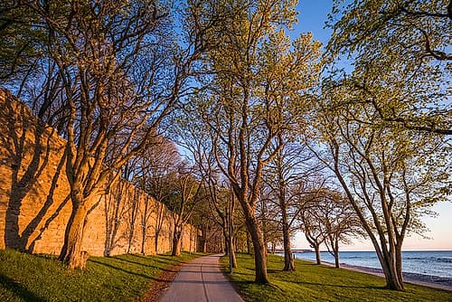 Sweden-Gotland Island-Visby-12th century city wall-most complete medieval city wall in Europe-sunse Coastal Print